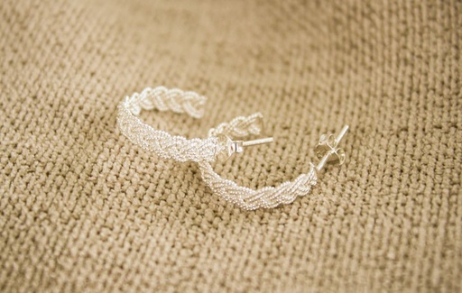 Braided hoop earrings in silver threads